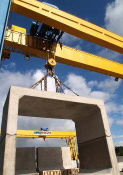 1) An innovative Matière modular concrete box bridge casting being lifted by a new crane.